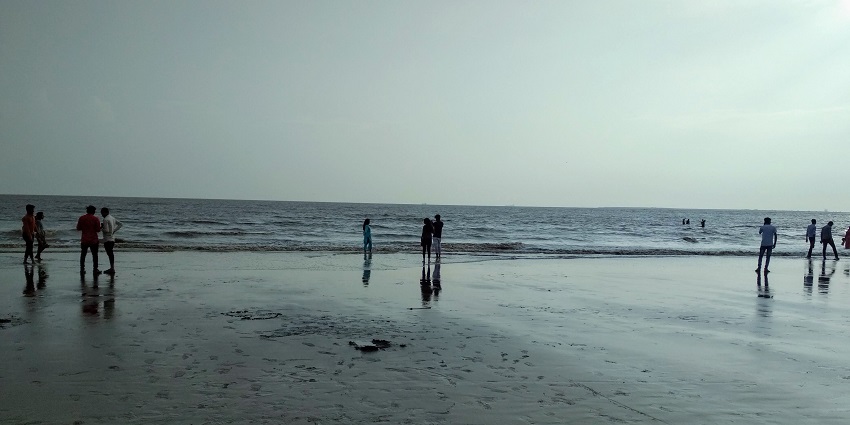 Visitors enjoying at Dumas beach near Ahmedabad in the evening.