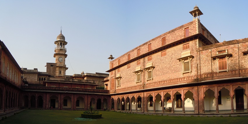 The interior courtyard of Umed Bhawan Palace, a popular tourist destination in Kota.