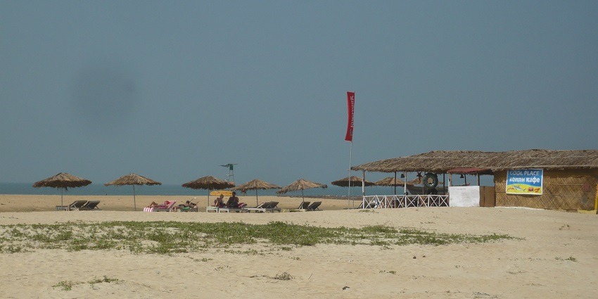 Panoramic view of the arabian ocean and the sandy shores of the Utorda Beach in Goa