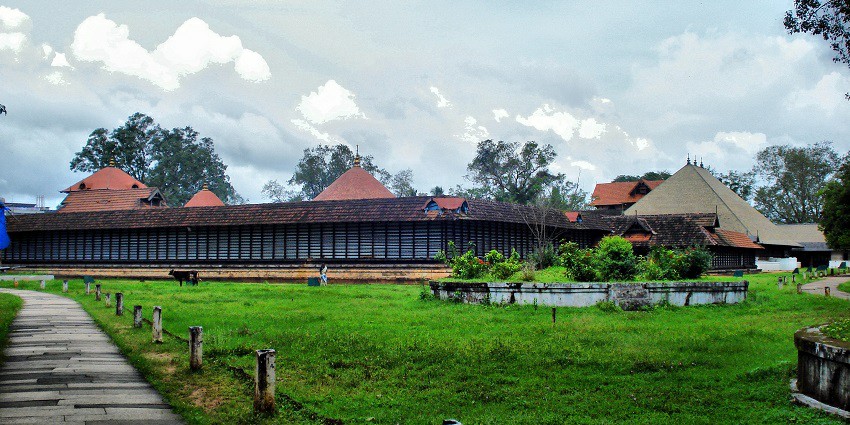Scenic view of Vadakkumnathan Temple, showcasing its intricate architecture and serene surroundings.