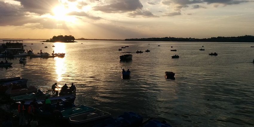 View of Van Vihar National Park, showcasing the beauty of the water body while the sun sets.