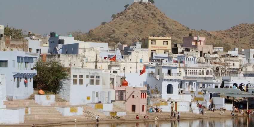 Devotees and visitors outside Varaha Temple in Pushkar, a site dedicated to Lord Vishnu.