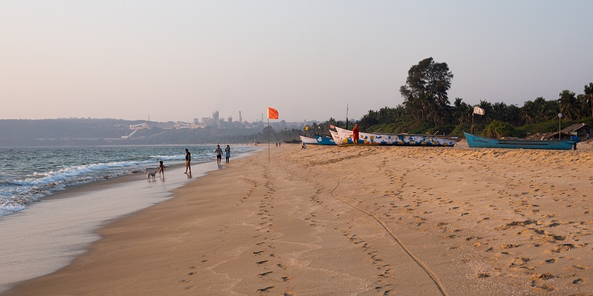 View of the golden shores of the beach at evening