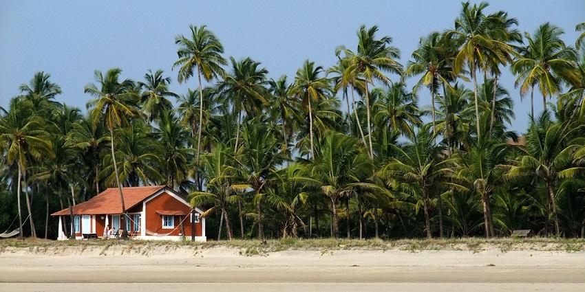Velsao Beach near the Kesarval Waterfall is a crystal-clear beach with white sand