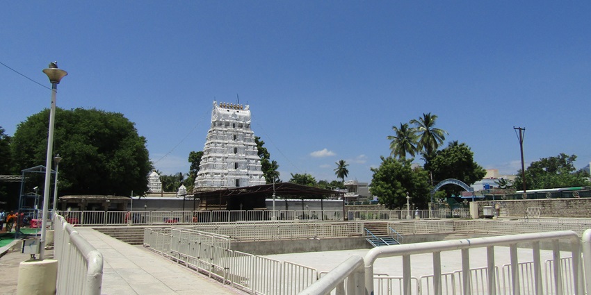 A distant picture of a temple dedicated to lord Balaj, built in traditional architecture