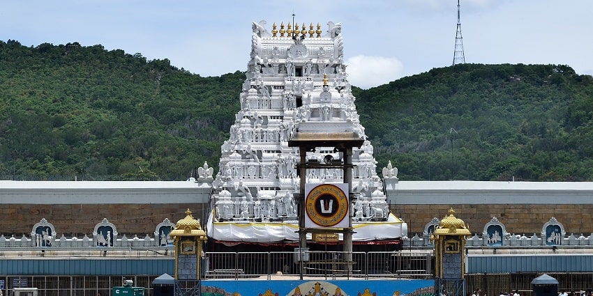 Beautiful entrance of Tirumala Venkateswara Temple with detailed carvings and vibrant colours.