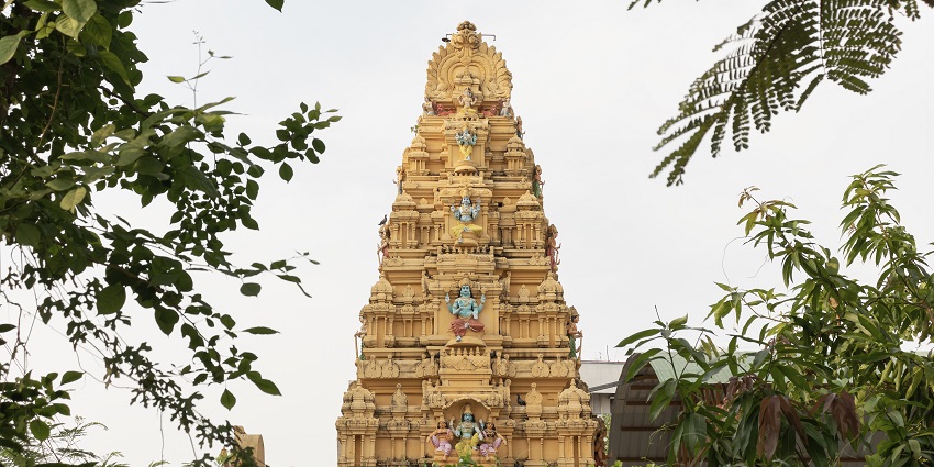 A stunning view of Venkateswara Temple, showcasing intricate architecture and vibrant colours.
