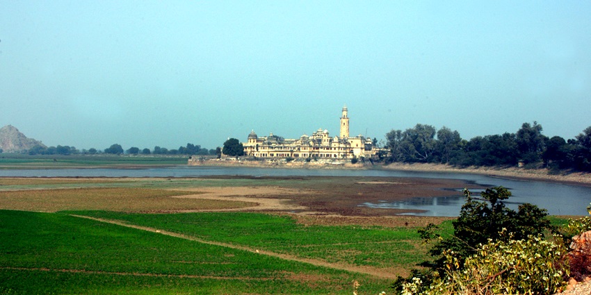 Vijay Mandir Palace surrounded by lush greenery, a best place near Alwar museum