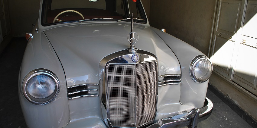A vintage Mercedes-Benz car is displayed at the Vintage & Classic Car Collection Museum in Udaipur.