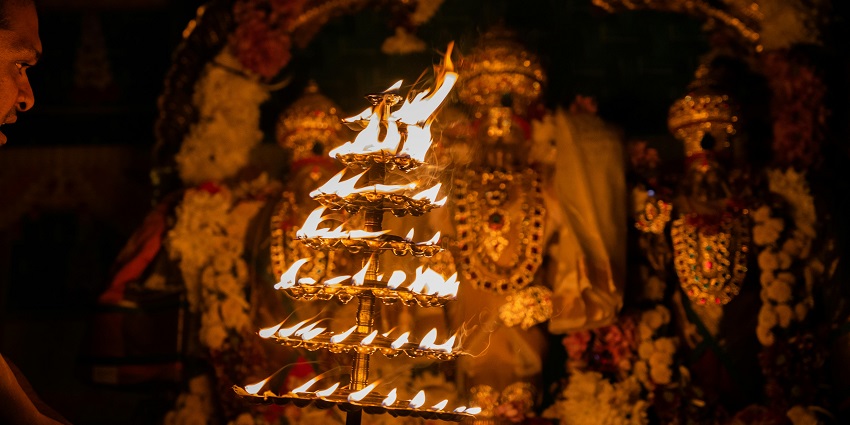 An image of Ahilyeshwar Temple's intricate stone carvings and serene surroundings.