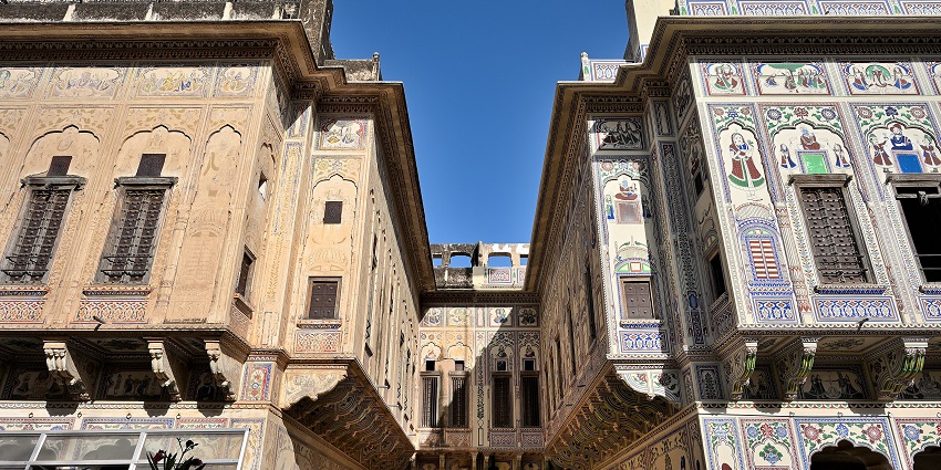 Chokhani Double Haveli features dual structure and mythological frescoes in Mandawa.