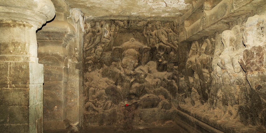 Elephanta Island featuring ancient caves, stunning sculptures, and beautiful landscapes