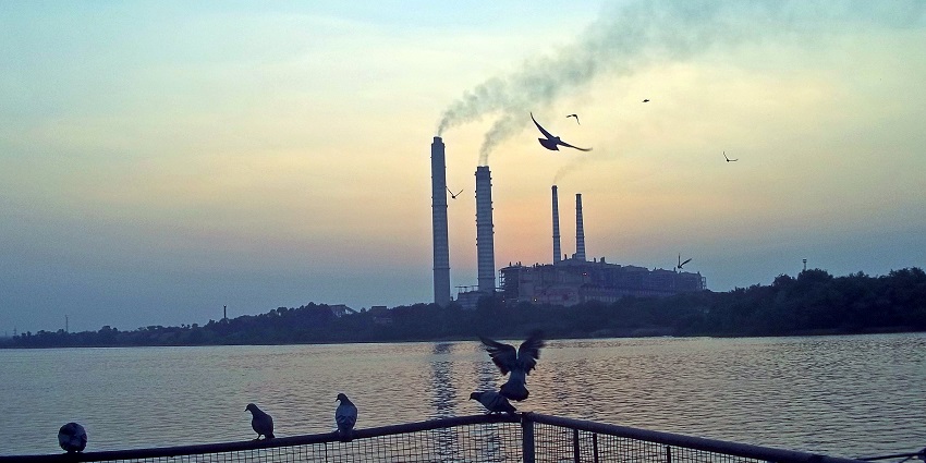 Charming sunset view of the Kota Barrage on the Chambal River, casting golden hues