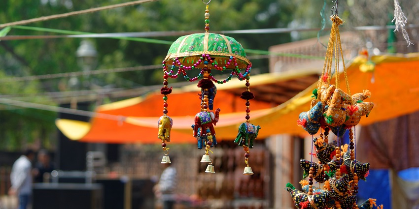 A glimpse of vibranlty coloured handicrafts hanging at the famous markets of the region.