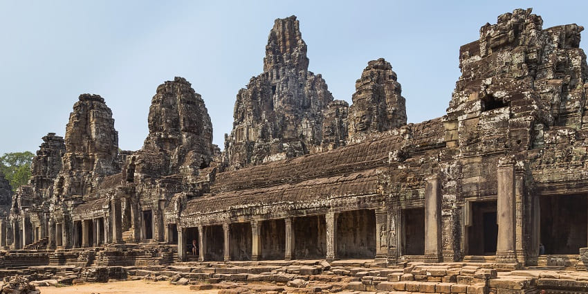 Close-up of the stone faces of Bayon Temple, known for its intricate and enigmatic carvings