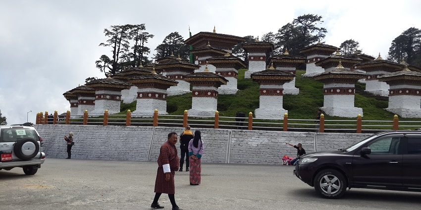 High mountain pass with 108 stupas and panoramic Himalayan views, must-see in Bhutan.
