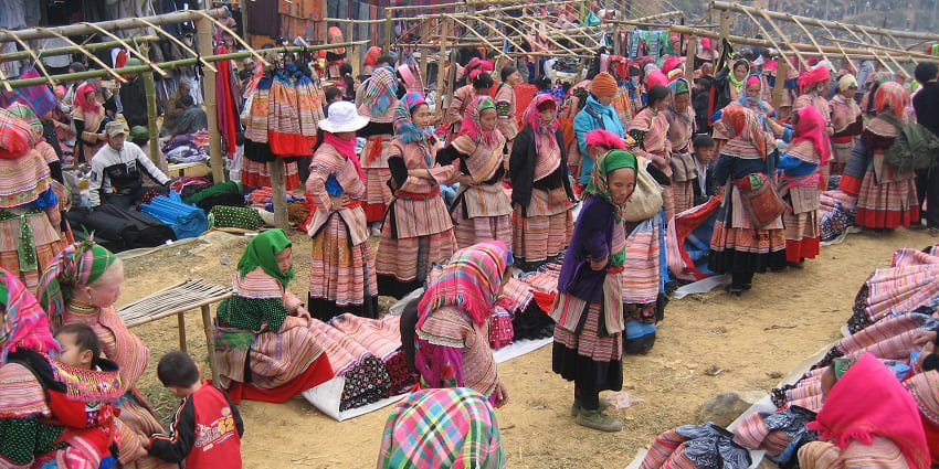 Vibrant Sapa Love Market with traditional attire and local crafts, quite a unique thing to see in Sapa