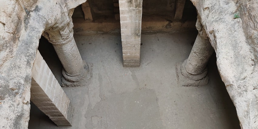 Uperkot Caverns, a significant historical site, has some elaborate carvings and pillars.
