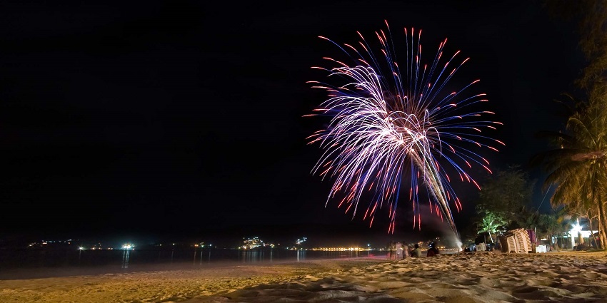 Mesmerising fireworks light up the night sky over Patong Beach in vibrant colours