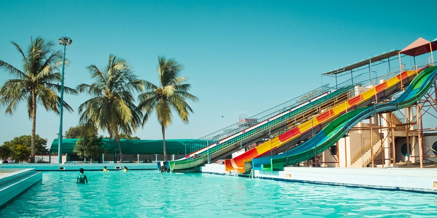 A view of colourful rides and serene wave pool at the Aqua Water Park Rajnandgaon.