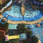 The water park in Ahmedabad consists of a wave pool and multiple water slides.