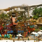 The water park in Gandhidham consists of a wave pool and multiple water slides.