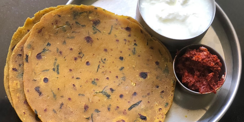 A plate of tasty theplas, famous regional dish in Gujarat, near Dwarkadhish Temple.