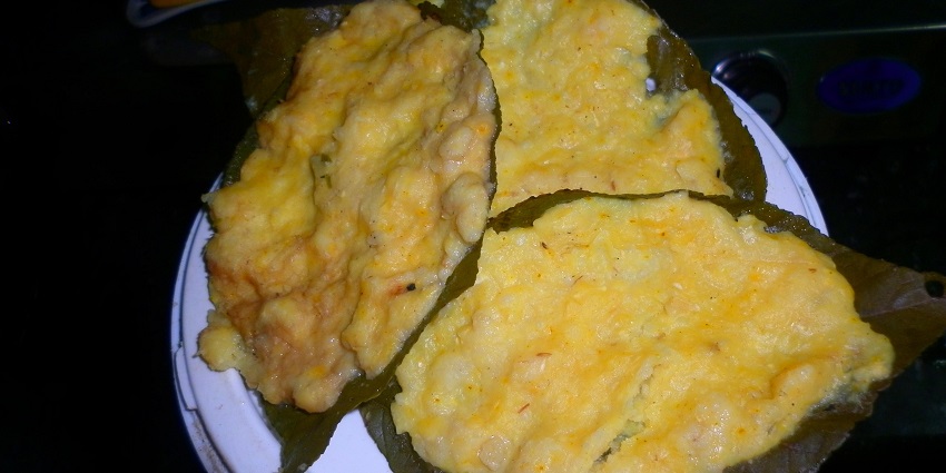 A traditional Indian dish called Pachole, served on a decorative plate, one of the best Himachali dishes