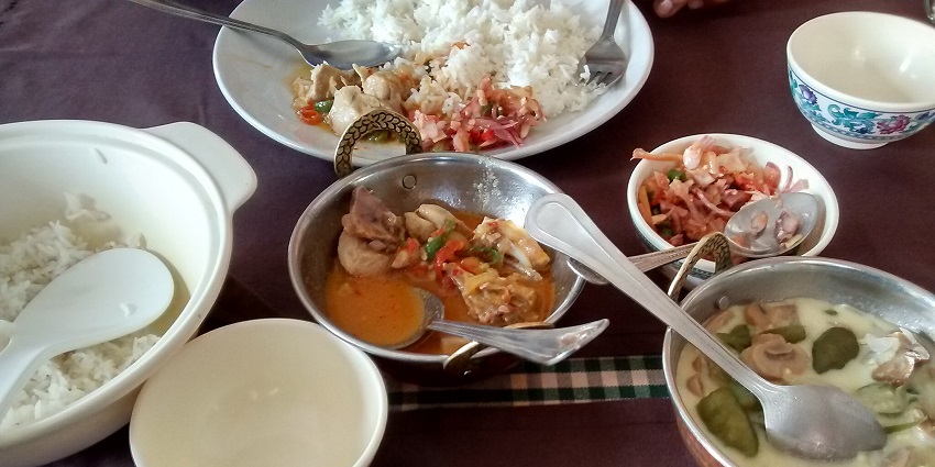 Traditional Bhutanese dish of rice served with Ema Datshi (chili cheese).
