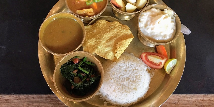 Savour a traditional Nepali meal in a restaurant located near to airports in Kathmandu.