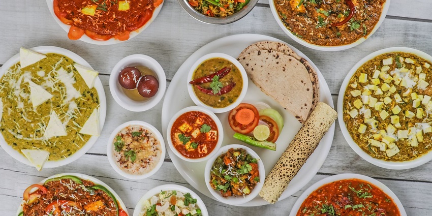 Image of Food, Indian, Cuisine with vibrant colours of curry and rice and roti