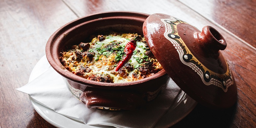 Savour the delicious dishes on your visit to Jamali Kamali Mosque and Tomb, South Delhi.