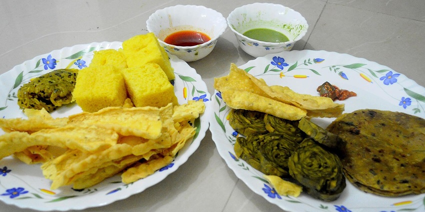 A typical Gujarati breakfast contains some delicious dishes.