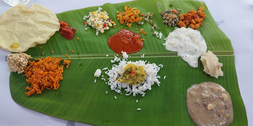 Image of delicious authentic Karnataka cuisine served on banana leaves