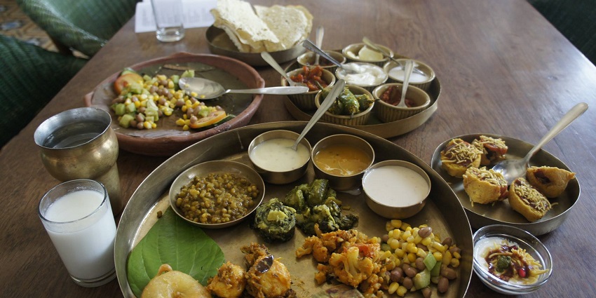 The Gujarati thali is served with many other dishes.