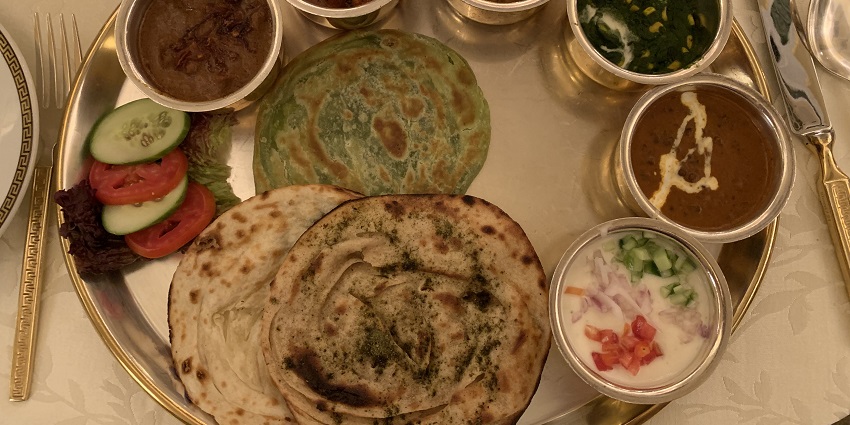 A mouth-watering view of a traditional Rajasthani thali served at hotels in Udaipur.