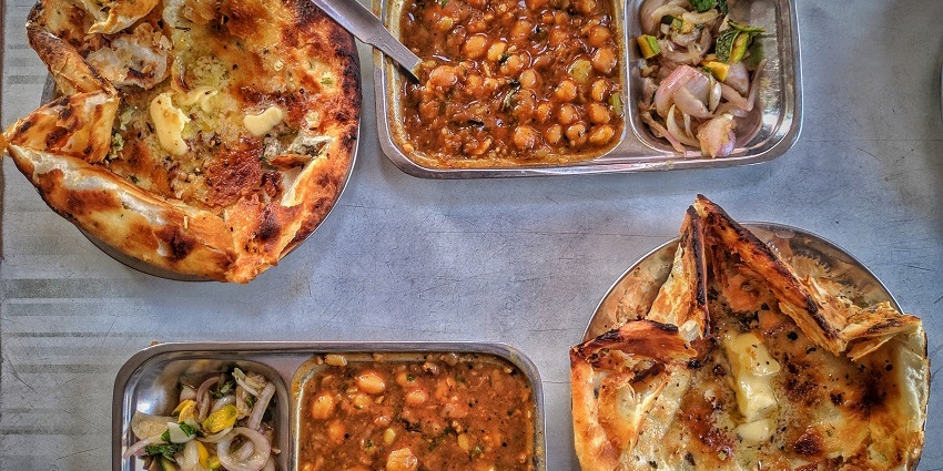 The picture was clicked at a famous food outlet in Amritsar of the famous Amritsari kulcha.