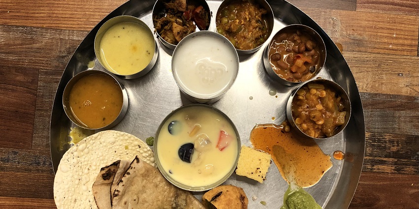 A variety of traditional local delicacies served near Blue Kingdom Water Park, Kota.