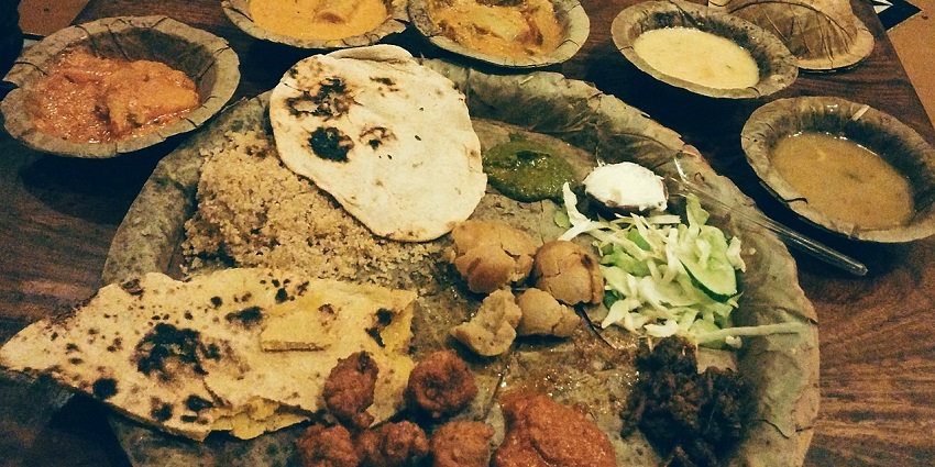 Devour a delicious traditional Rajasthani thali reflecting the tastes of Rajasthan.