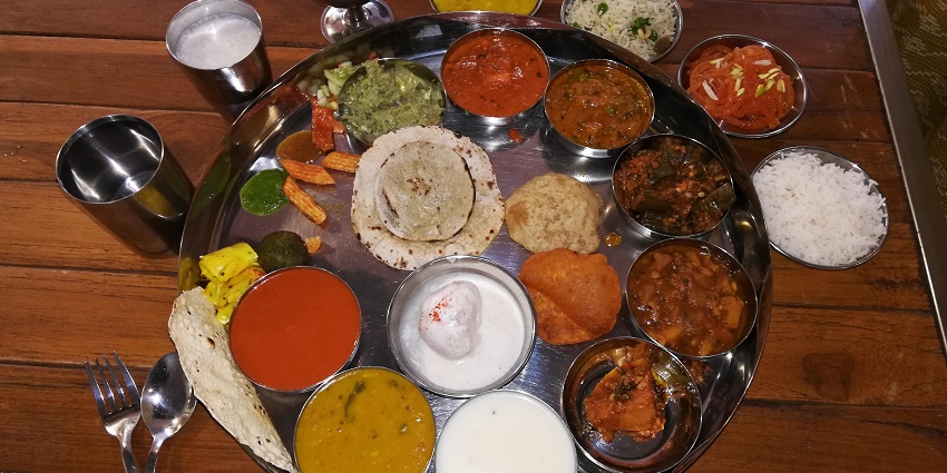 Image of authentic Rajasthani food thali can be found near Kumbhalgarh, Udaipur