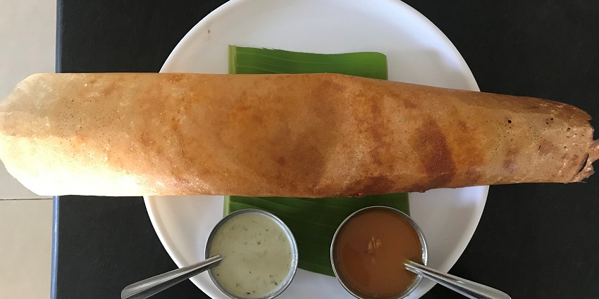 A picture of a savoury masala dosa served at a restaurant near the Aare waterfall