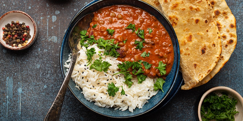 Authentic punjabi thali with rajma rice and delicious paranthas