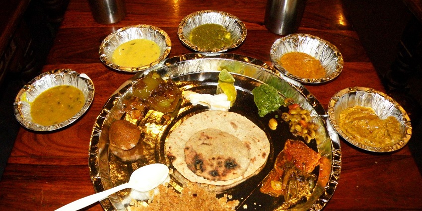A traditional Rajasthani thali featuring local delicacies in eateries near Tal Chhapar Wildlife Sanctuary.