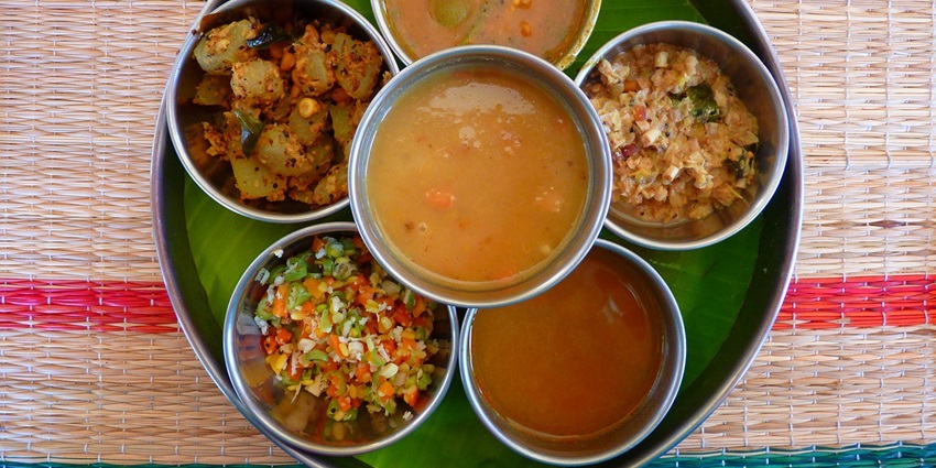 A spread of traditional delicacies, offering a taste of the region's rich culinary heritage near Mukundra Hills National Park.