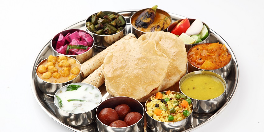 The Rajasthani culinary scene features traditional dishes served in thali and more.