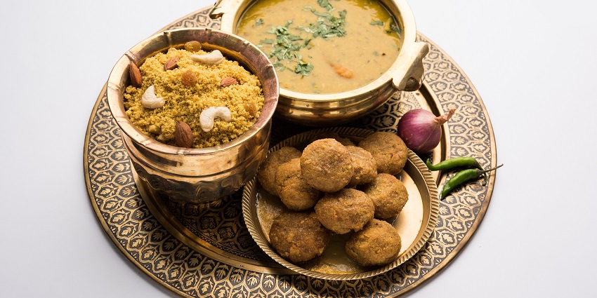 Savour Rajasthani cuisine like Daal Baati Churma in rustic dhabas and elegant venues.