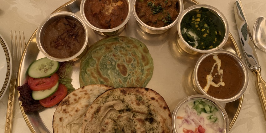 Delicious Rajasthani thali with dishes such as Dal Baati served in local eateries.