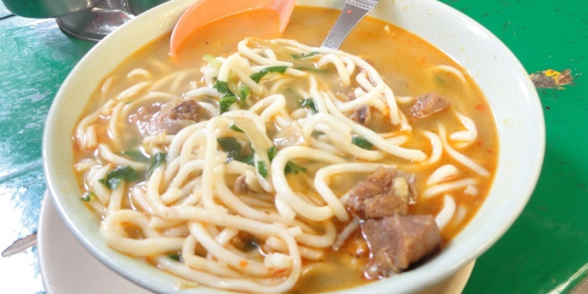A bowl of Thukpa, one of the best authentic dishes served at a restaurant nearby