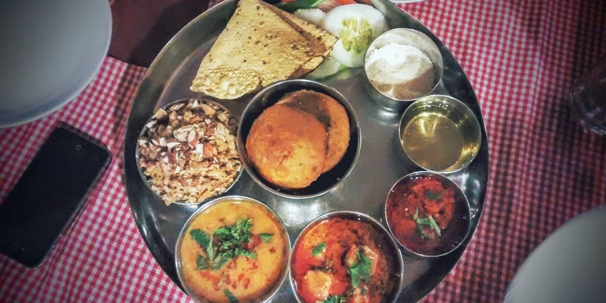Image of authentic Rajasthani cuisine served at local eateries near the Rat Temple.