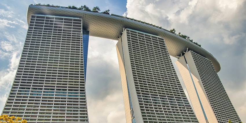 The Marina Bay Sands resort in Singapore, features its iconic three-tower structure.
